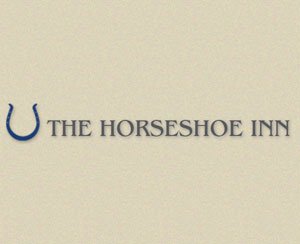 The logo for The Horseshow Inn, sponsors of Pocklington Tennis Club